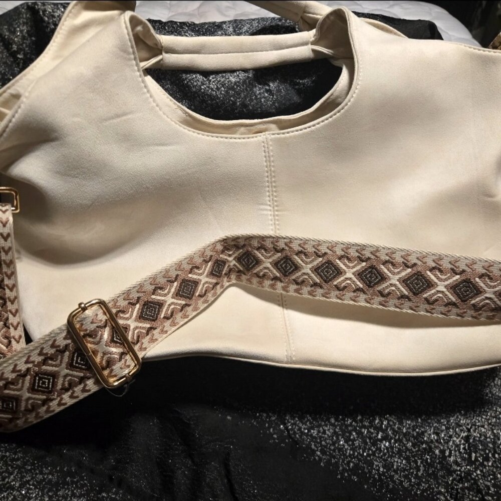 Hobo bag with guitar strap